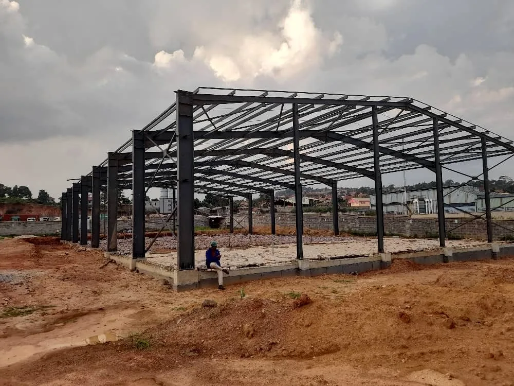 Brentec Vaccine Facility — steel portal frame erection, SMAARam Engineers Uganda