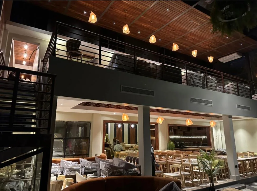 Hero Restaurant — premium structural steel frame, glass curtain wall and mezzanine, Kampala