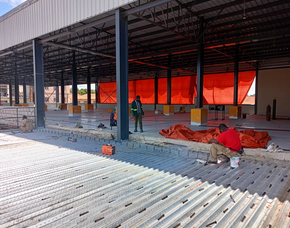 Motor Care Nakawa — composite floor, metal decking and roofing works, Kampala